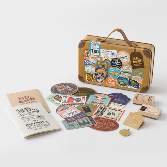 The joy of TRAVELER’S notebook lies in its ability to be freely customized. When you customize it to your liking and fill it with all the things you love, your TRAVELER’S notebook becomes like an extension of yourself. That’s why, even though they’re all the same notebook, every one looks different depending on the person using it. And it is precisely those differences that make TRAVELER’S notebook so appealing.

To commemorate its 20th anniversary, TRAVELER’S COMPANY has created “TRAVELER’S notebook 20th Anniversary Customization Set,” a tin containing customization items such as stickers, charms, and stamps.

Pre-orders open: June 1st
Official product launch: July 1st

The set includes 11 types of stickers featuring designs of TRAVELER’S HOTEL and TRAVELER’S AIRLINES, a brass charm and brass clip commemorating the 20th anniversary, stamps to expand the ways you can use your notebook, and a history guide summarizing the 20-year history of TRAVELER’S notebook. All of these items are housed in a tin designed to resemble a trunk.

Every TRAVELER’S notebook that is cherished and used with care radiates a glow like a treasure. When travelers from all over the world show each other their notebooks, conversations flow easily even among those meeting for the first time on their journeys, allowing them to understand one another beyond gender, age, and nationality.

It has been 20 years since the TRAVELER’S notebook was born. We hope that TRAVELER’S notebook will continue to be such a presence for years to come.

“TRAVELER’S notebook 20th Anniversary Customization Set,” will be released sequentially at TRAVELER’S Notebook 20th Anniversary event venue, as well as at TRAVELER’S FACTORY, TRAVELER’S COMPANY USA, and TRAVELER’S COMPANY Partner Shops starting July 1, 2026.

@miscstore.ams @misc.distribution @travelers_company #travelerscompanypartnershop #travelersnotebooks #lexispapper #lundcity